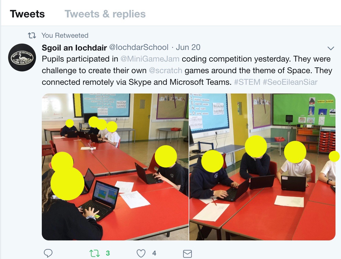Screenshot of twitter post of Photo of children programming computers with faces obscured by yellow dots
